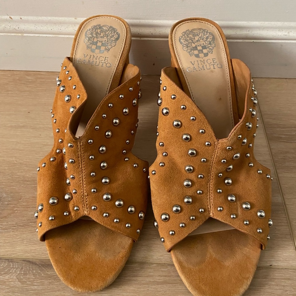 Mustard yellow, studded mules.